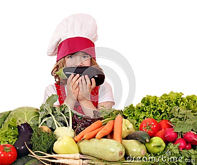 Little girl cook with eggplant Stock Photo