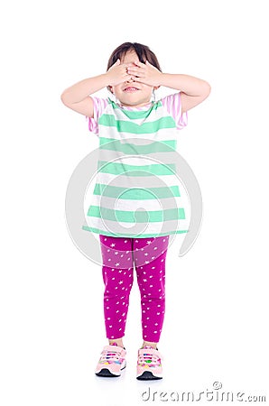 Little girl cover her eyes by hands over white Stock Photo