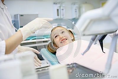 Little girl at dentist office Stock Photo