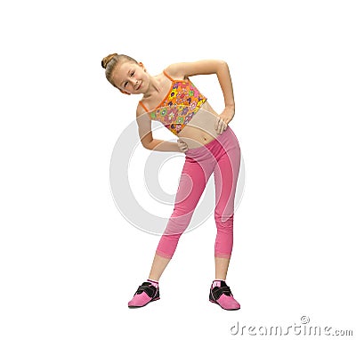 Little girl does exercises Stock Photo