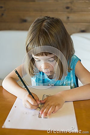 Little girl drawing a straight Stock Photo