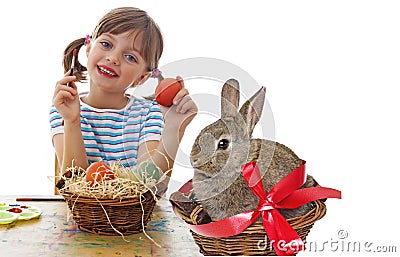 Little girl with easter rabbits Stock Photo