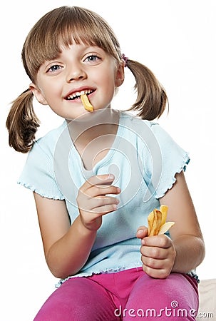 Little girl eating a potato chips Stock Photo