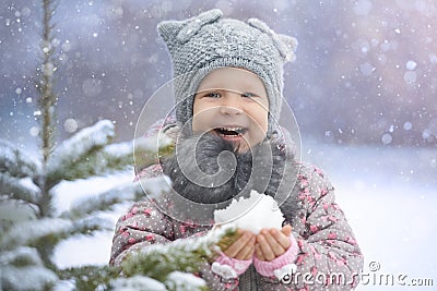 Little girl enjoying first snow Stock Photo