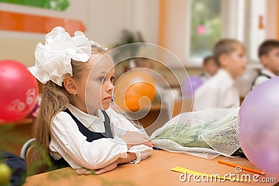 Little girl for the first time in school Stock Photo