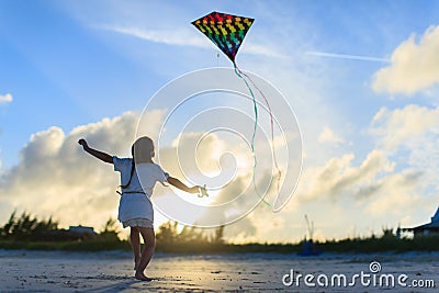 Little girl flying a kite Stock Photo