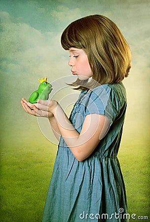 Little girl with a frog prince Stock Photo