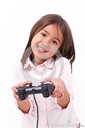Little girl gamer playing video game Stock Photo