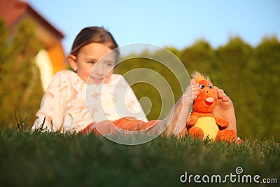 Little girl in the garden Stock Photo