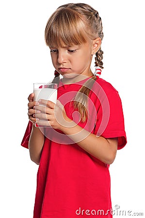 Little girl with glass of milk Stock Photo