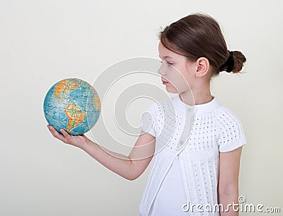 The little girl and globe. Stock Photo