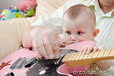 Little girl and guitar Stock Photo