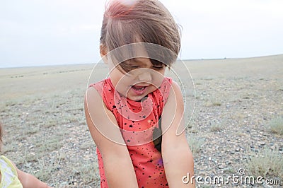 Little girl happy smiling in big landscape environment. Child emotionally with expression outdoor Stock Photo
