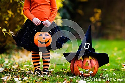 Little girl having fun on Halloween trick or treat Stock Photo