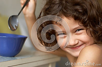 Little girl having her breakfast Stock Photo