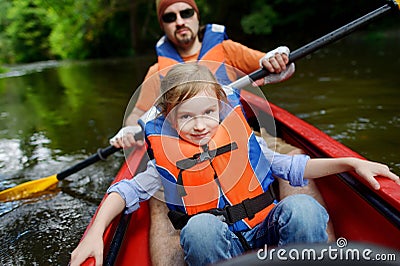 Little girl and her father on a kayak Stock Photo