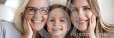 Little girl her young mother and mature grandma family portrait Stock Photo