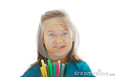 Little girl holding crayons Stock Photo