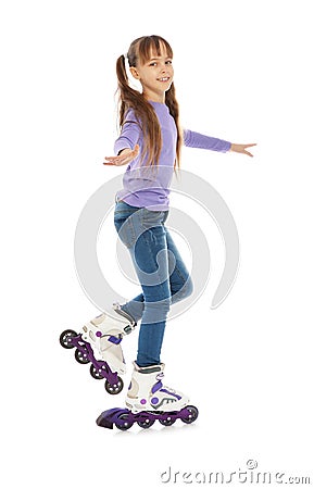 Little girl with inline roller skates Stock Photo