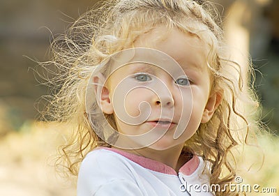 Little girl with kinky hair Stock Photo