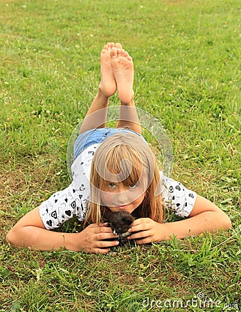 Little girl with a kitty Stock Photo