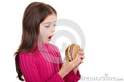 Little girl looking hamburger Stock Photo