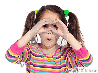 Little girl looking through imaginary binocular Stock Photo