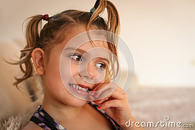 Little girl with loose tooth. Stock Photo