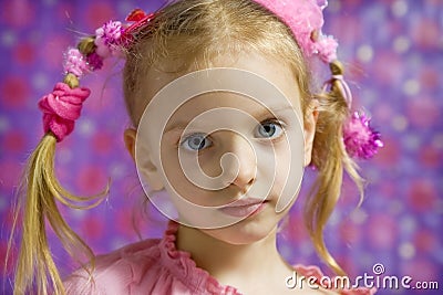 Little girl making faces Stock Photo