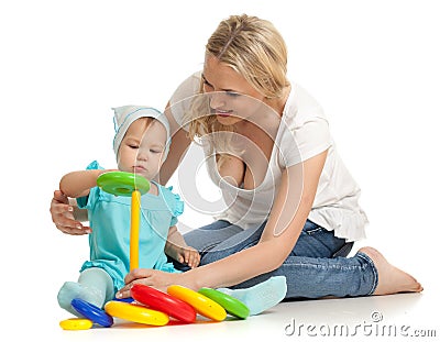 Little girl and mother with color pyramidion Stock Photo