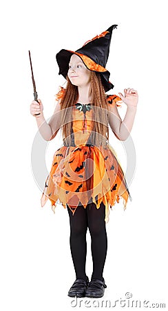 Little girl in orange costume of witch for Halloween Stock Photo