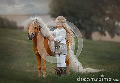 Little girl with palomino miniature horse in summer day Stock Photo