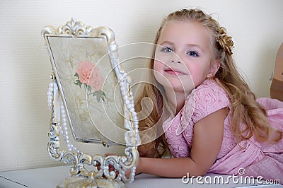 Little girl in a pink dress Stock Photo