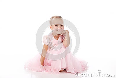 Little girl in a pink elegant dress Stock Photo