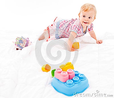 Little girl playing with building blocks Stock Photo