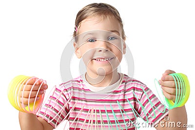 Little girl playing with colorful plastic spring Editorial Stock Photo
