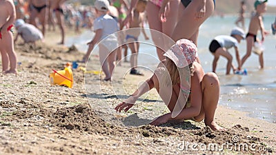 Little Girl is Playing in the Sand on the Beach. Stock Footage - Video of beautiful, lifestyle: 89450686 