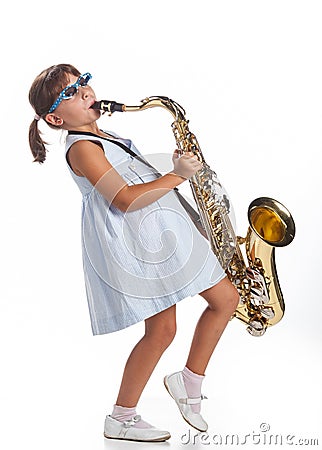 little girl playing saxophone 27091539