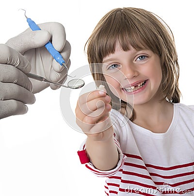 Little girl pointing her missing teeth Stock Photo