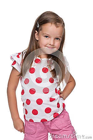 Little girl in a polka dot blouse Stock Photo