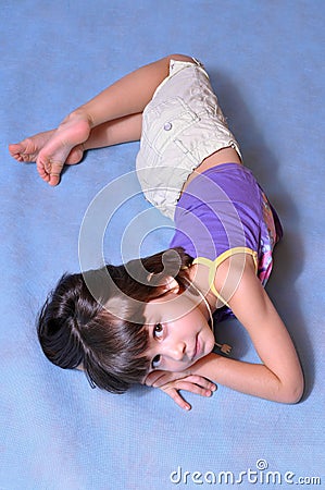 Little girl posing in studio Stock Photo