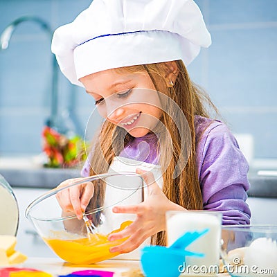 Little girl preparing cookies Stock Photo