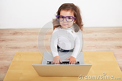 Little girl pretending to be business woman Stock Photo