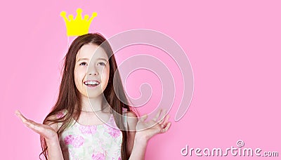 Little girl princess, crown, isolated on pink background. Kid wear golden crown symbol princess. Lady little princess Stock Photo