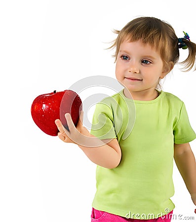 Little girl with red apple Stock Photo