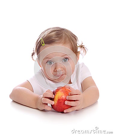 Little girl with red apple Stock Photo