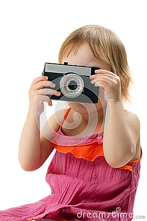Little girl with retro camera Stock Photo