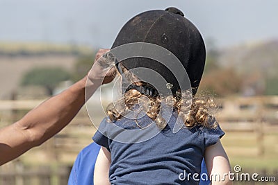 A Little Girl Riding Stock Photo