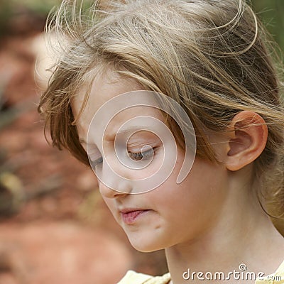 A Little Girl's Face Shows Disappointment Stock Photo