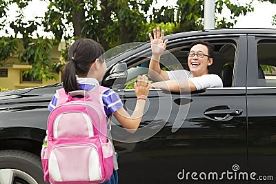 Little girl say good bye with father Stock Photo